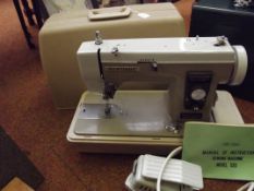 Cased New Home sewing machine