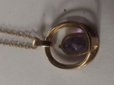 9 carat gold pendant set with amethyst diamonds on