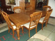Large good quality extending dining table and six