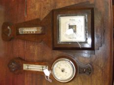 Two oak cased wall barometers