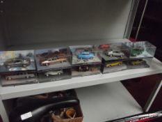 10 boxed collectable cars, to include 007