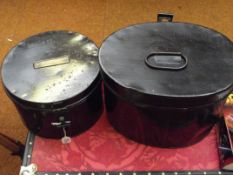 Two metal hat boxes