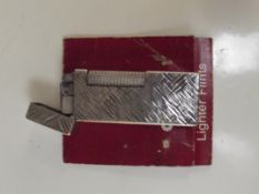 Vintage Dunhill cigarette lighter with additional