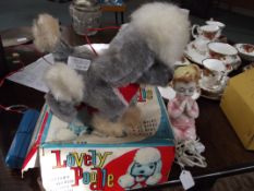 Japanese 1960's remote controlled poodle in origin