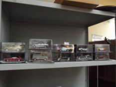 10 boxed collectable cars, to include 007