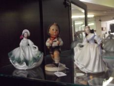 Two Royal Doulton figures together with a Hummel f