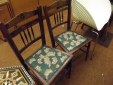 Pair of Edwardian oak hall chairs