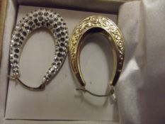 Pair of 9 carat gold earrings