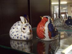 2 Royal Worcester paperweights with gold stopper