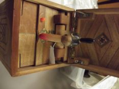 Novelty marquetry inlaid cigarette dispenser