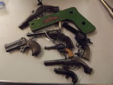 Remanco cigarette lighter in the form of pistol to
