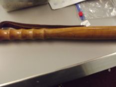 Truncheon with turned handle