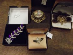Collection of four vintage brooches