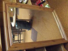 Large wood framed mirror