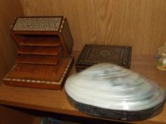 Parquetry inlaid cigarette box together with a further musical example with concertina action,