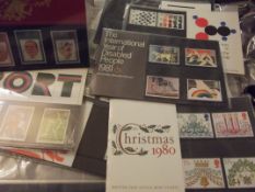 Collection of nine packs of mint British stamps