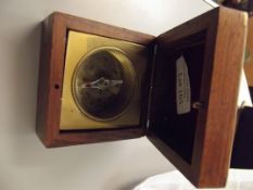Compass in teak case