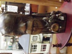 Heavy carved wood figure