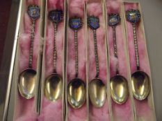 Six boxes of continental silver souvenir spoons, a