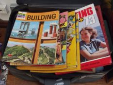 Box of vintage magazines and case