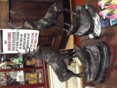 Pair of bronze stags signed