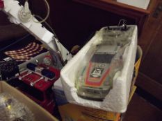 Two remote control cars together with a fire engin