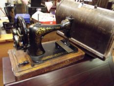 Cased Singer sewing machine