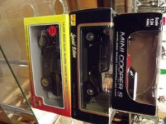 Three boxed model cars