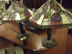 Pair of matching tiffany style lamps with metal ba