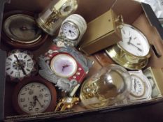 Various clocks to include an anniversary clock