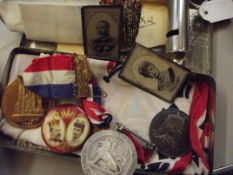 Collection of commemorative medals in related tin