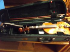 Cased violin and bow