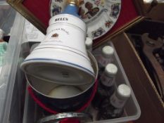 Various commemorative items to include a bottle of