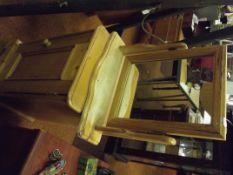 Dressing table mirror and a bedside cabinet