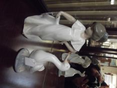 Nao girl together with a Nao goose