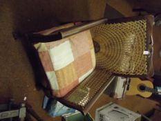 Rattan armchair with ball and claw feet