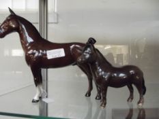 Two Beswick horses