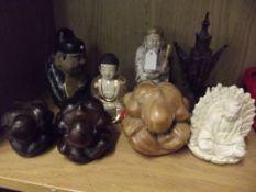 Collection of treen and ceramic Buddhas