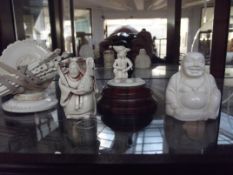 Four ivory figures