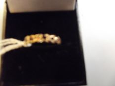 9 carat gold dress ring set with garnet