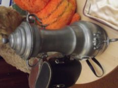 Framed pewter water tap