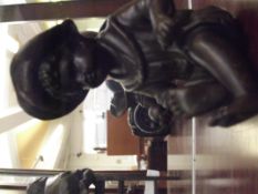 Bronze child sitting