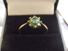 9 ct gold and emerald cluster ring