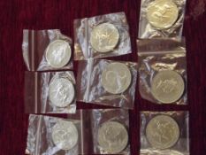 Collection of 8 crowns and one 5-pound coin