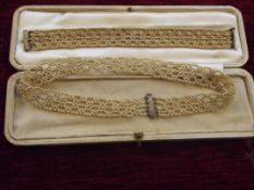 Pearl? choker and bracelet