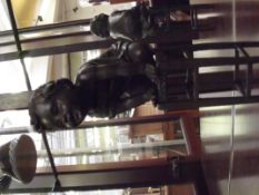 Bronze child on stool signed, Juan Clara