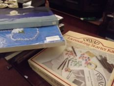 A lace making starter kit together with some unope