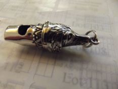 Silver stamped dog whistle