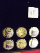 Cased set of six commemorative HMS Victory coins