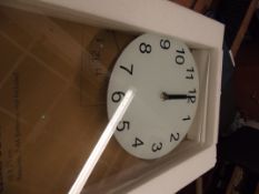 Clear glass pendulum wall clock